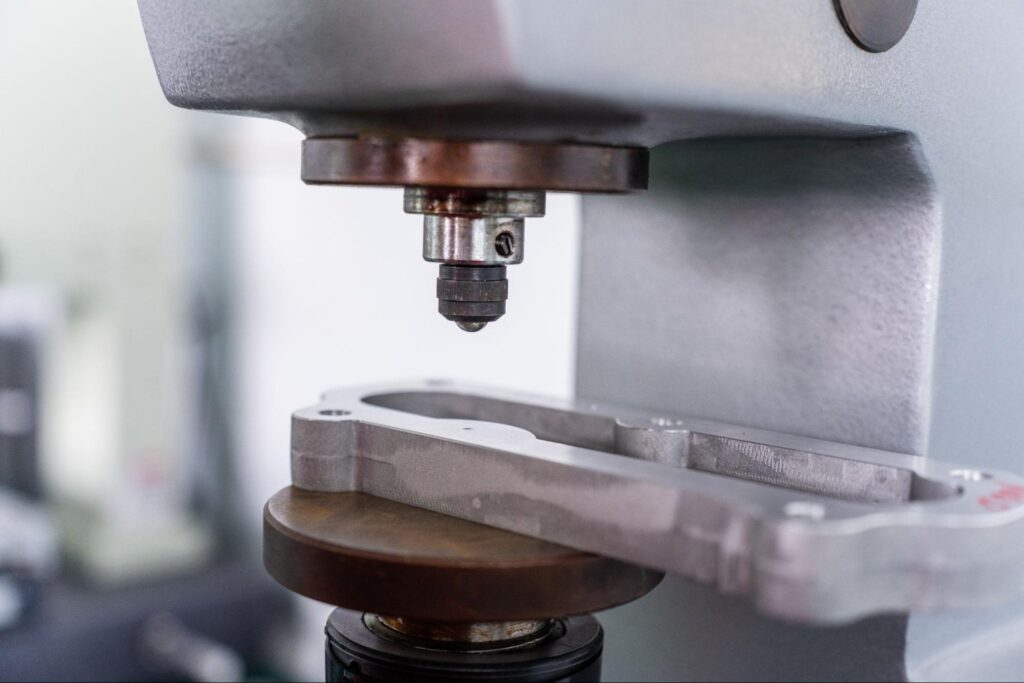 Close-up of a metal hardness testing machine